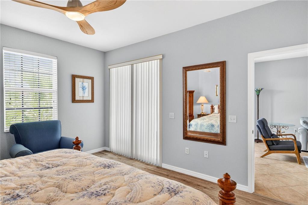 Bedroom with light wood-type flooring and ceiling fan