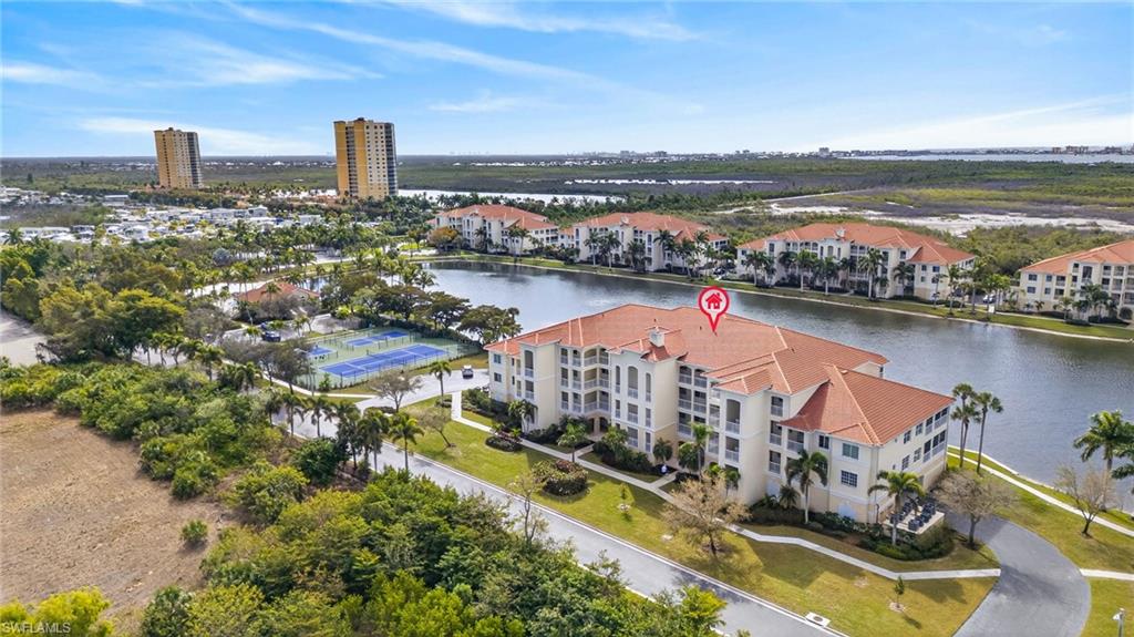 Bird's eye view of apartment complex / building and a large body of water