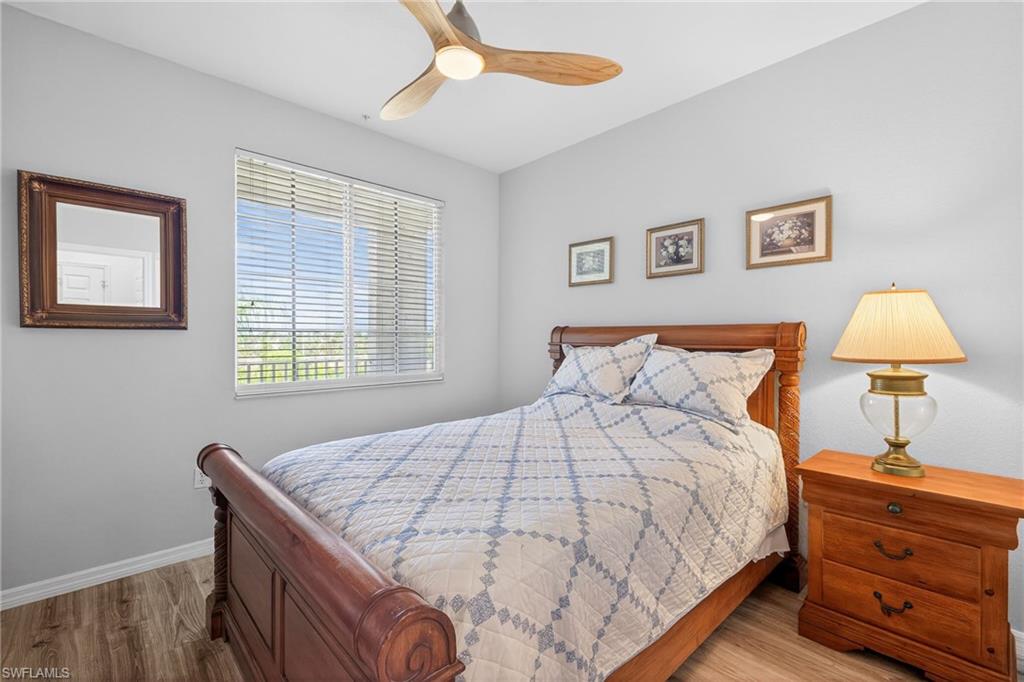 Bedroom with light wood-style flooring and ceiling fan