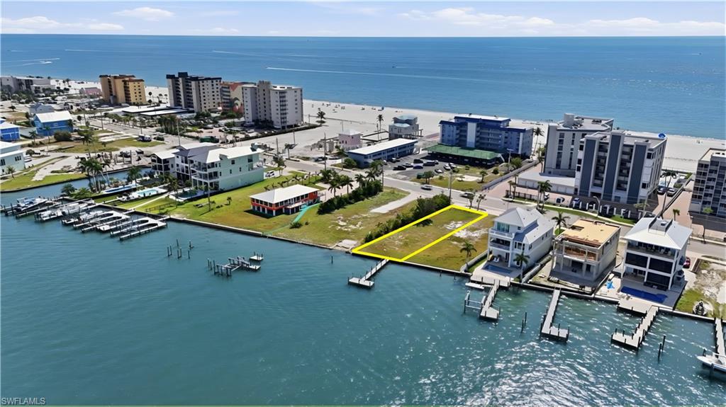 View of urban area featuring a large body of water - Virtually Edited Image
