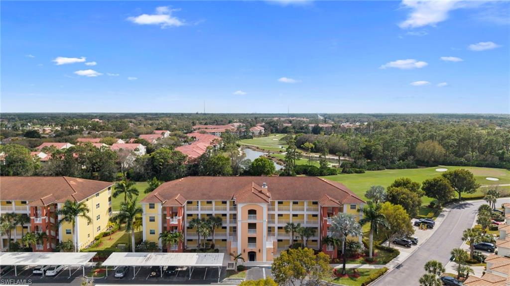 Aerial view of a nearby body of water and a local golf course