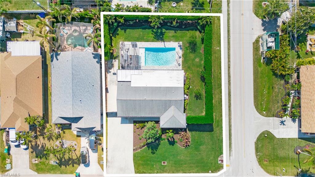 Drone / aerial view of a pool area
