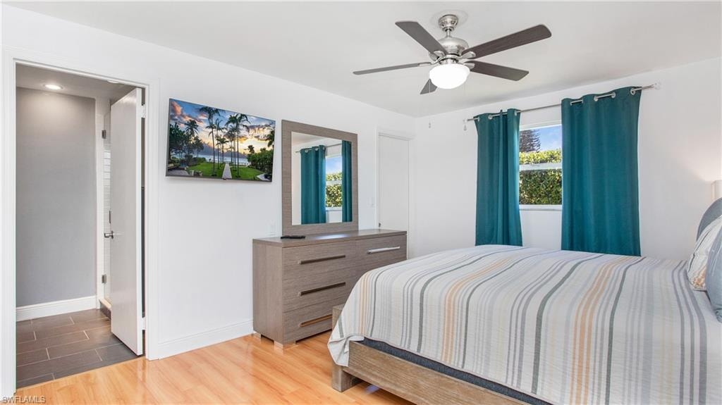 Bedroom featuring light wood finished floors and a ceiling fan
