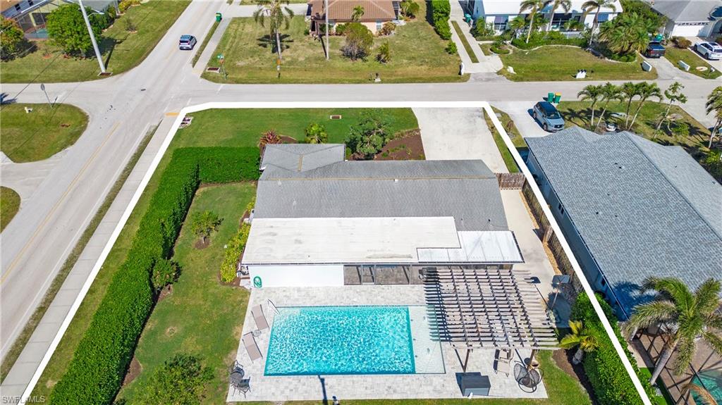 Aerial view of residential area with a pool