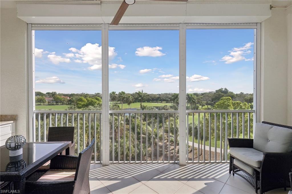 Screened Balcony lanai, overlooking golf course, featuring plenty of natural light, electric grill
