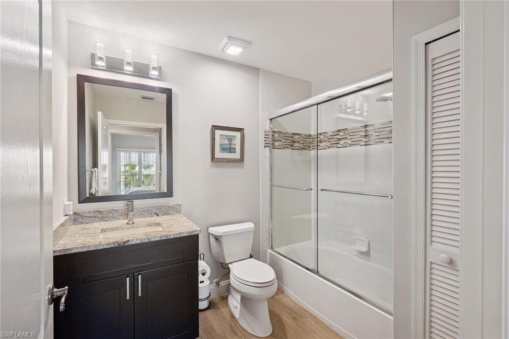 Full Bathroom featuring a closet, combined bath / shower