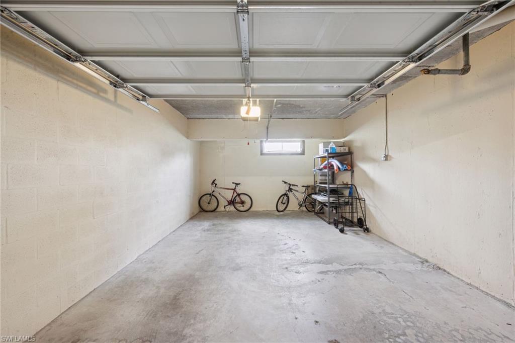 View of over-sized, private access garage