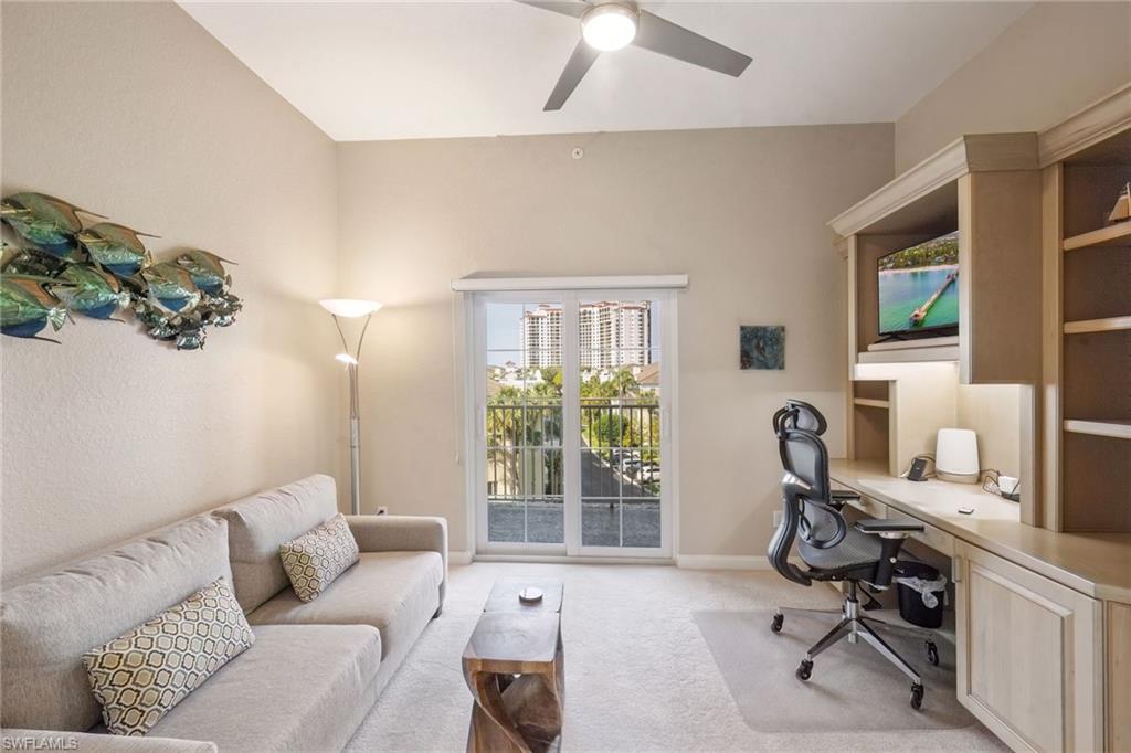 Bedroom #3, Home office with light carpet and balcony access