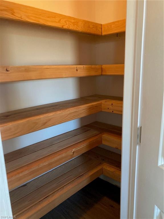 Walk in Pantry with wood shelf toppers
