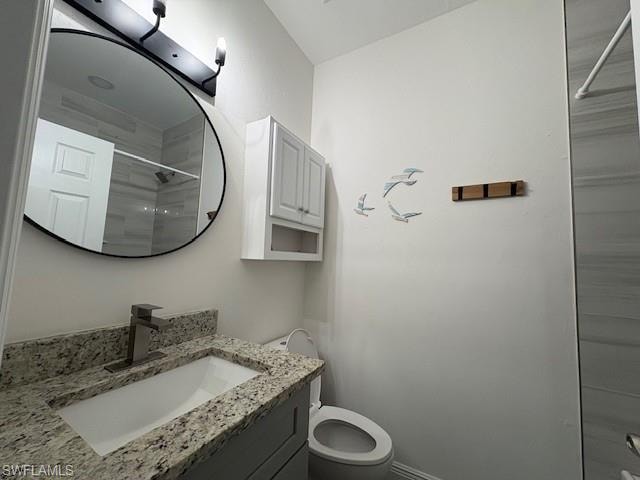 Bathroom with vanity and a shower