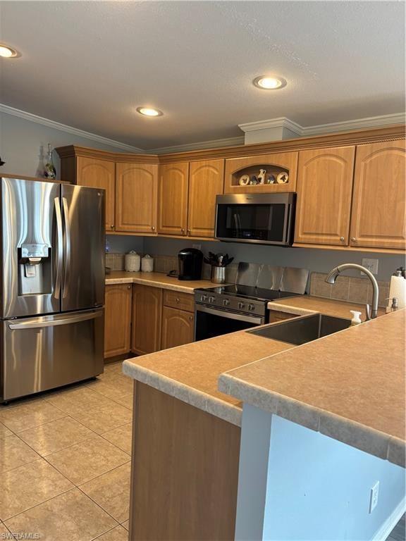 Kitchen featuring stainless steel appliances, crown molding, light countertops, recessed lighting, and wood finish cabinetry