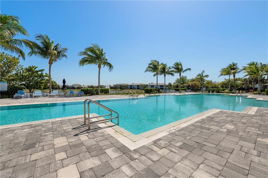 Community pool with a patio area