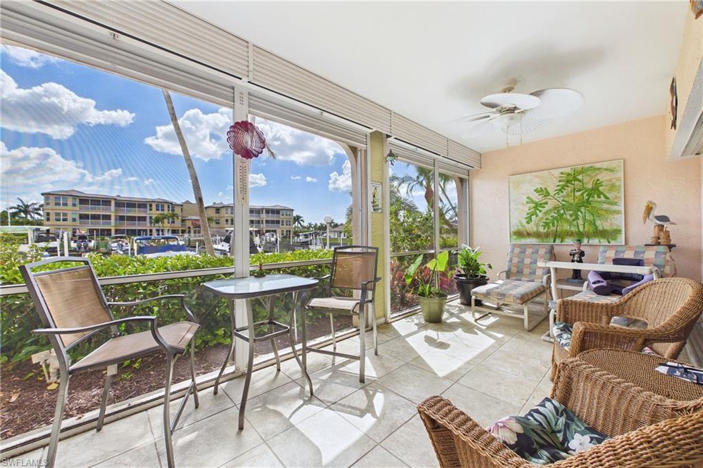 Lanai Sunroom / solarium with tile patterned floors