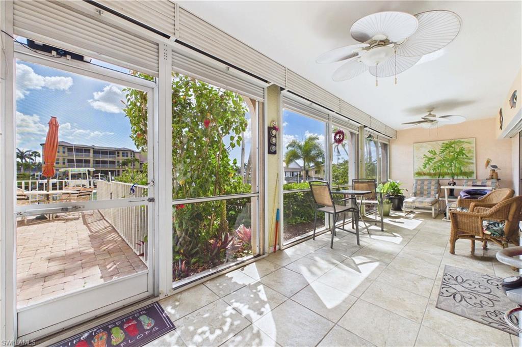 Sunroom with tile patterned floors