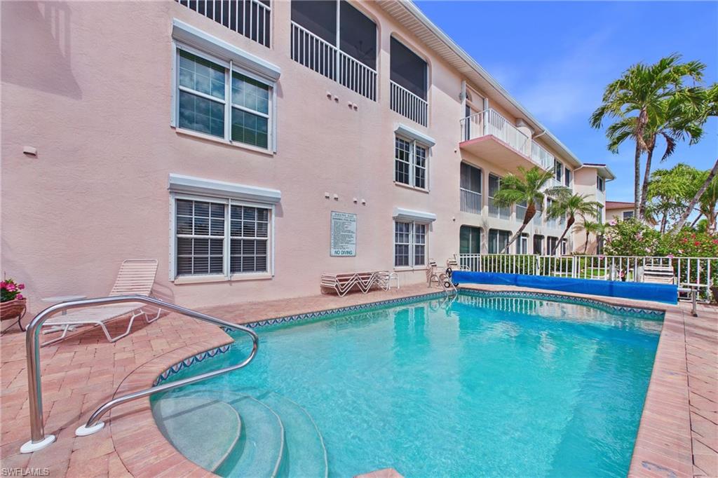 View of heated swimming pool with patio surround