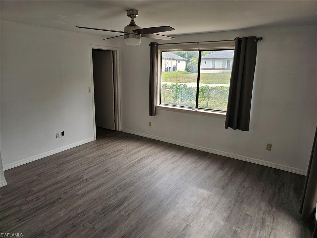 master bedroom with walk in closet