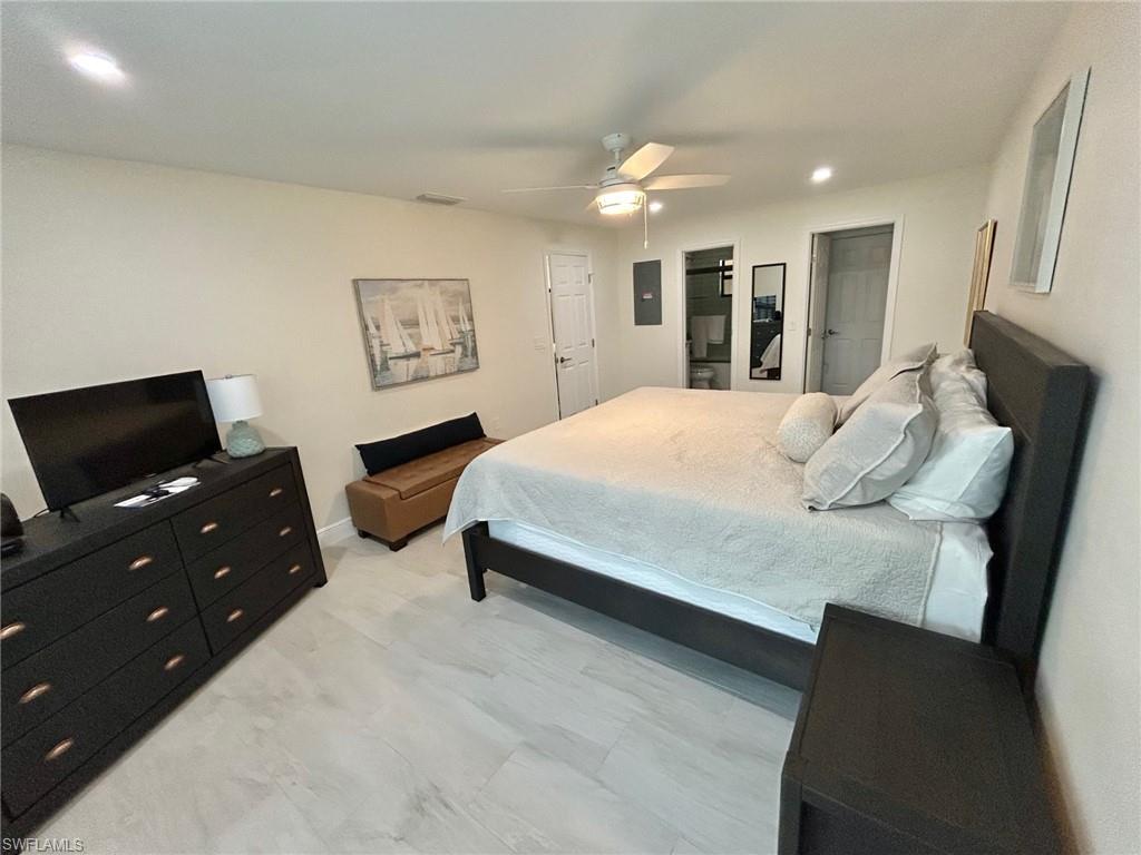Primary bedroom featuring recessed lighting and a ceiling fan