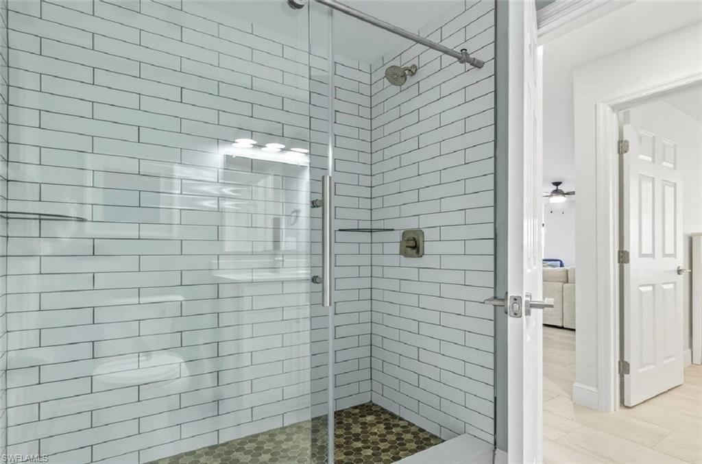 Bathroom featuring a shower stall