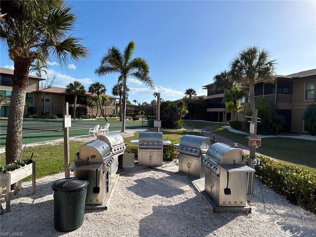 Surrounding community featuring a residential view and grilling area