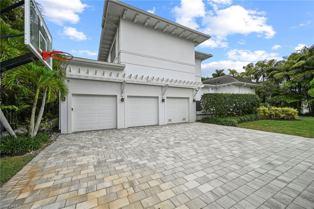 Garage with decorative driveway
