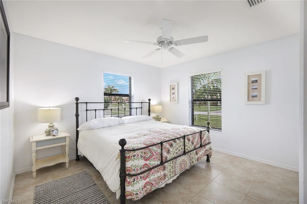Bedroom featuring ceiling fan and light tile patterned floors