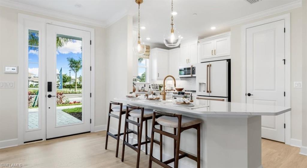 15339 Giardino Drive, Unit 104 - Model Home Leaseback - Available Now for Closing!