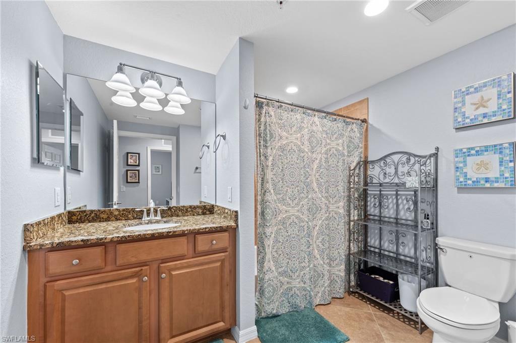 2nd Bathroom with vanity, a shower/tub combination
