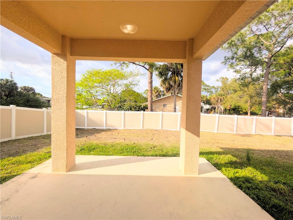 Fenced backyard featuring a patio area