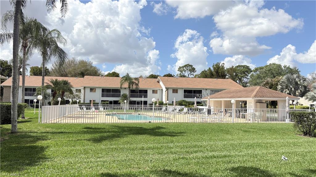 Community pool featuring a patio
