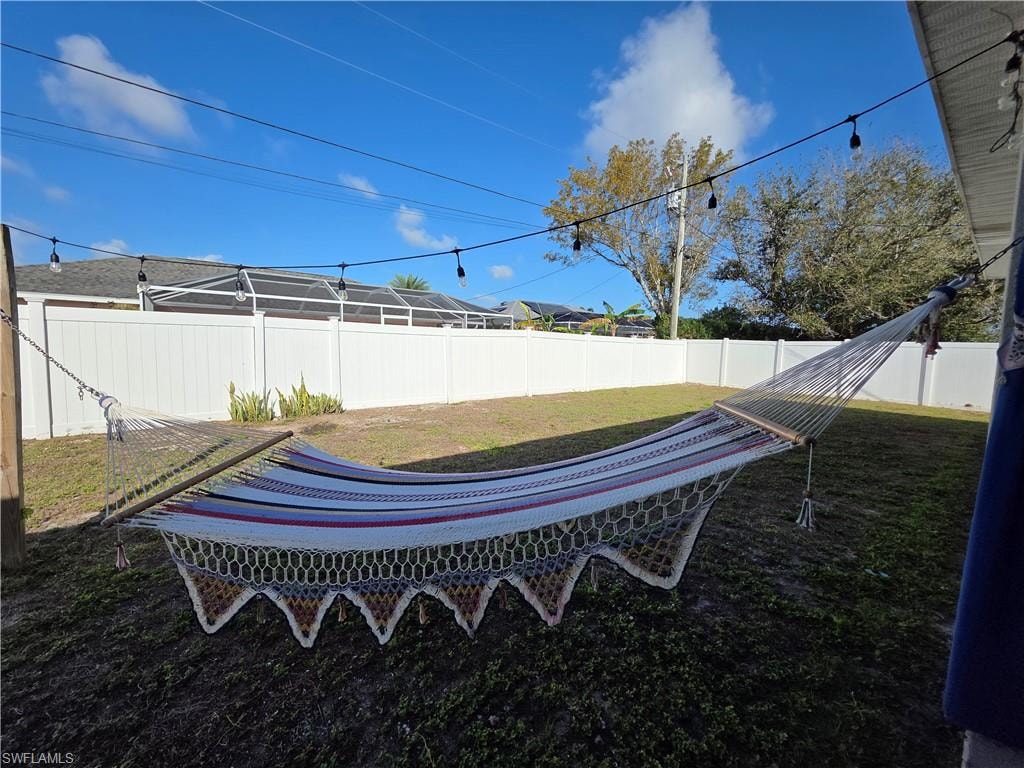 View of fenced backyard