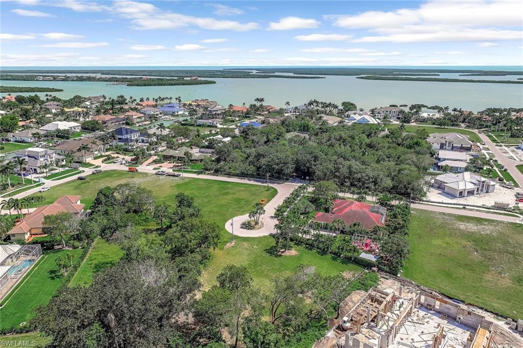 Aerial view of residential area with a large body of water