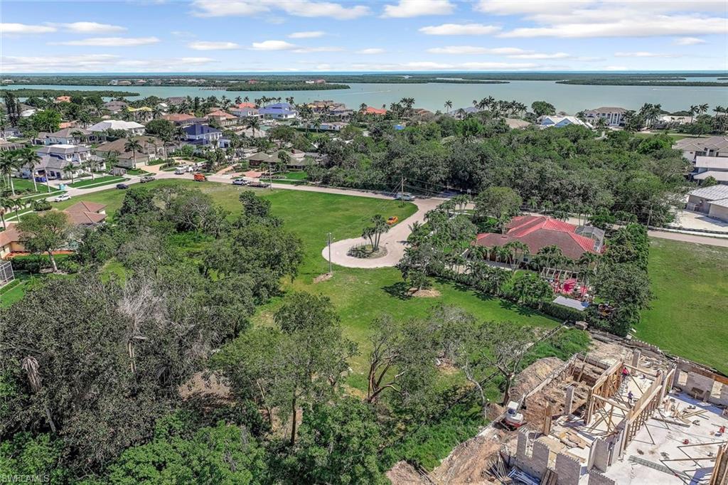Aerial view of residential area with a nearby body of water