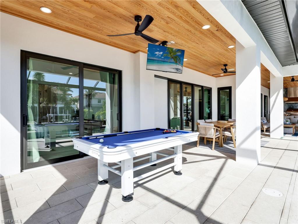 View of patio / terrace with ceiling fan and outdoor dining area