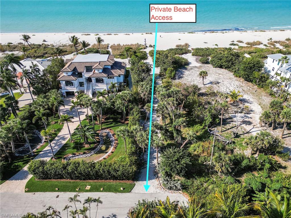 Gulf Shores private beach access. Beach chairs and umbrella stoarge on path.