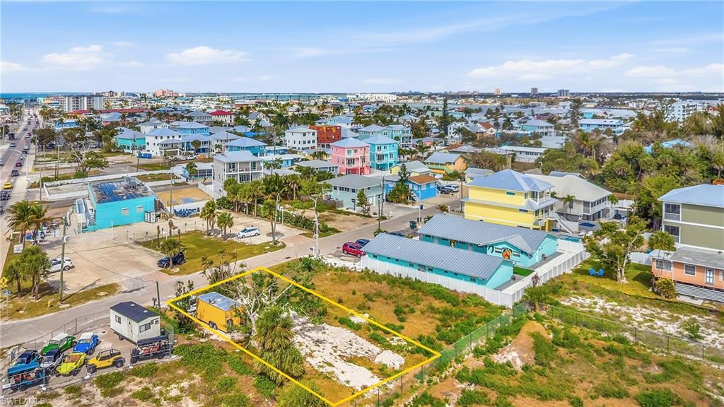 Aerial view of property's location featuring property parcel outlined