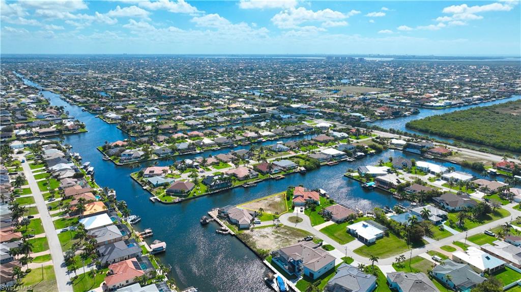 Aerial view of residential area with a nearby body of water
