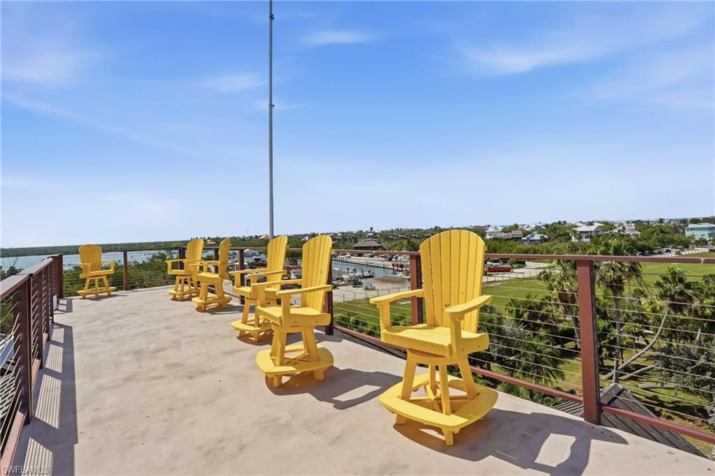 View of patio / terrace with a water view