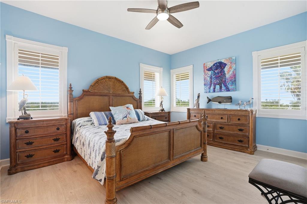 Bedroom featuring light wood-style floors and a ceiling fan