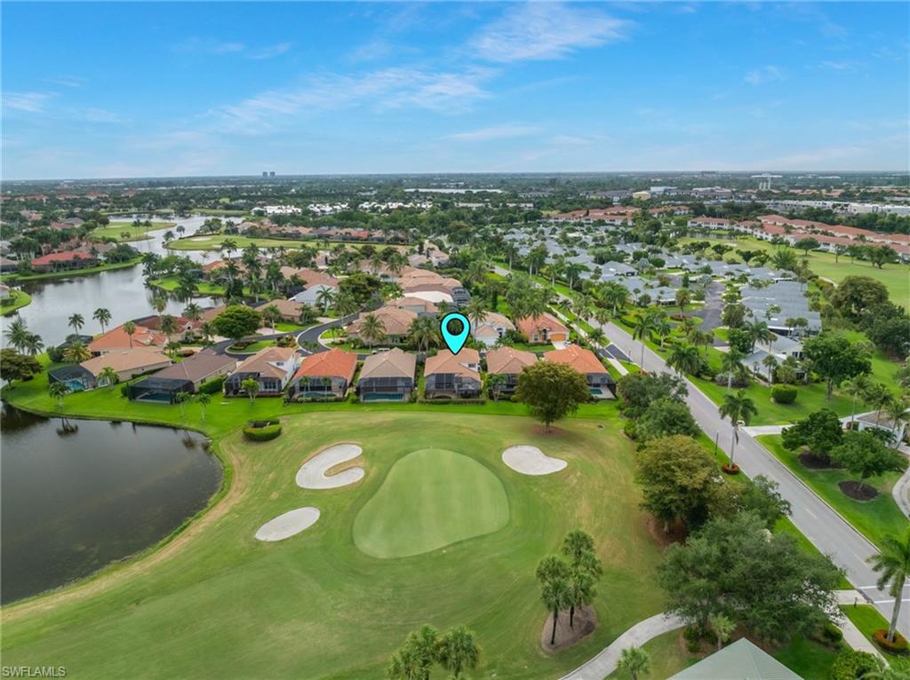Aerial perspective showcasing a residential community with abundant green spaces