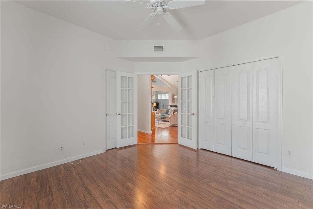 Second Bedroom/Study featuring wood-finish flooring and a ceiling fan