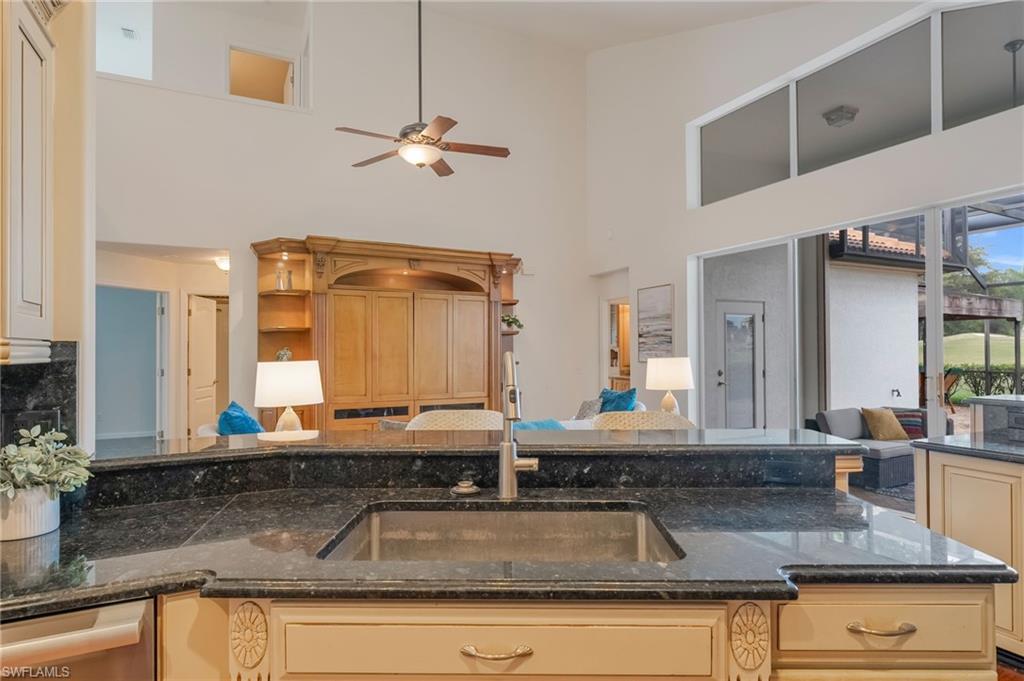 Gourmet Kitchen featuring beautiful wood cabinetry and granite countertops