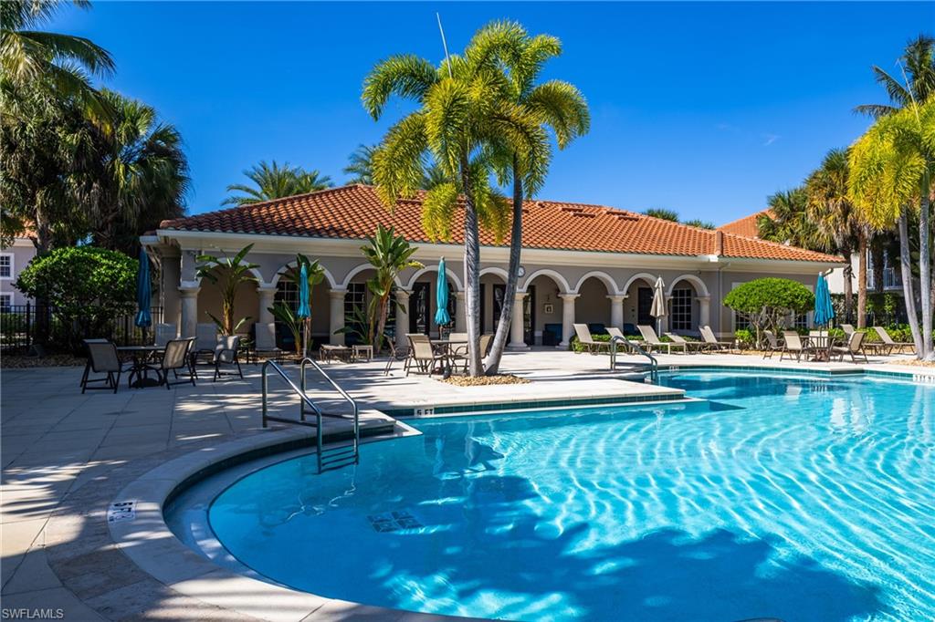 Community pool featuring a patio area