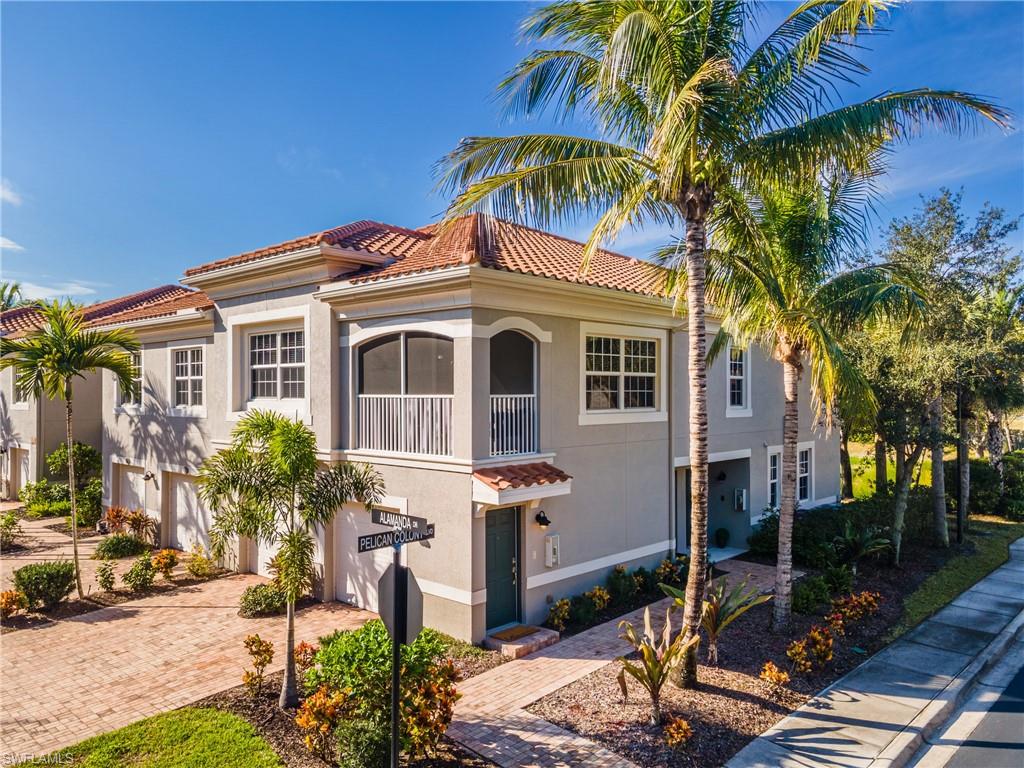 Mediterranean / spanish-style house featuring an attached garage, stucco siding, a balcony, decorative driveway, and a tiled roof