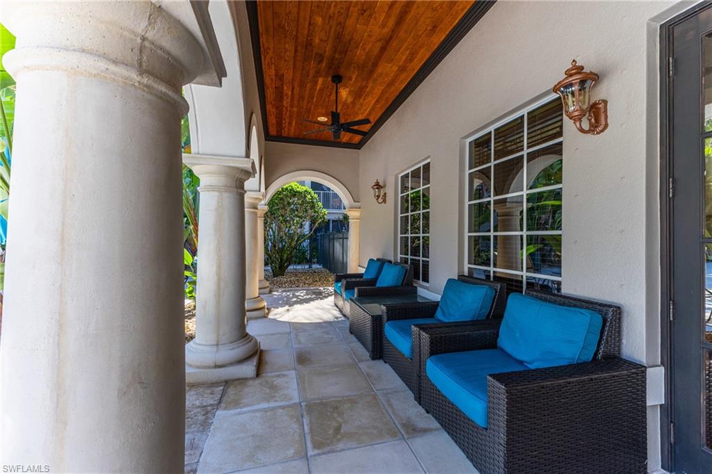 View of patio featuring a ceiling fan