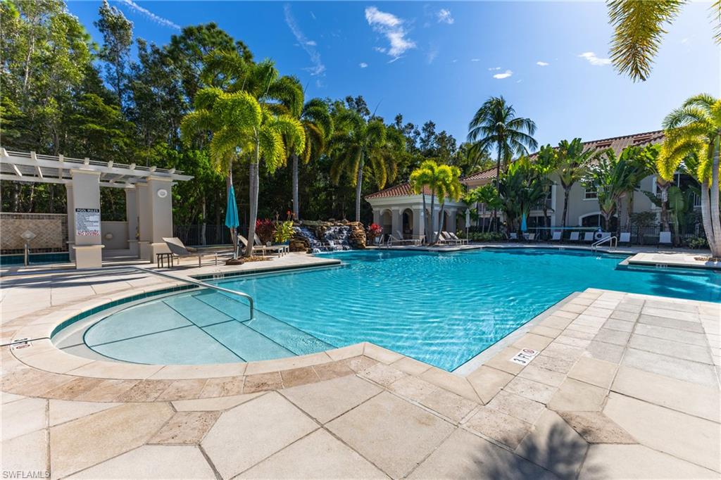 Community pool with a patio area