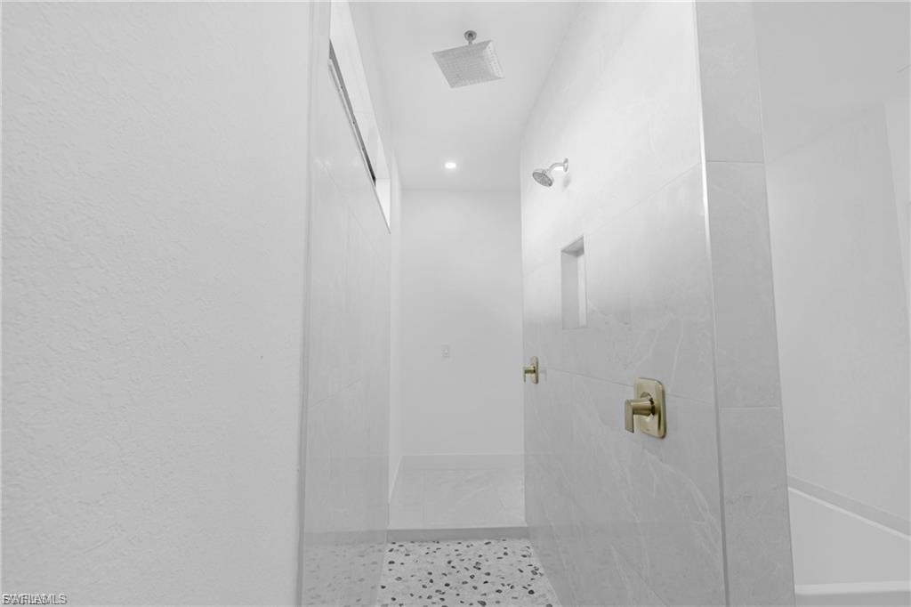 Bathroom featuring a walk in shower