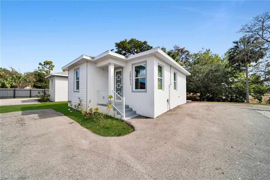 Bungalow with stucco siding