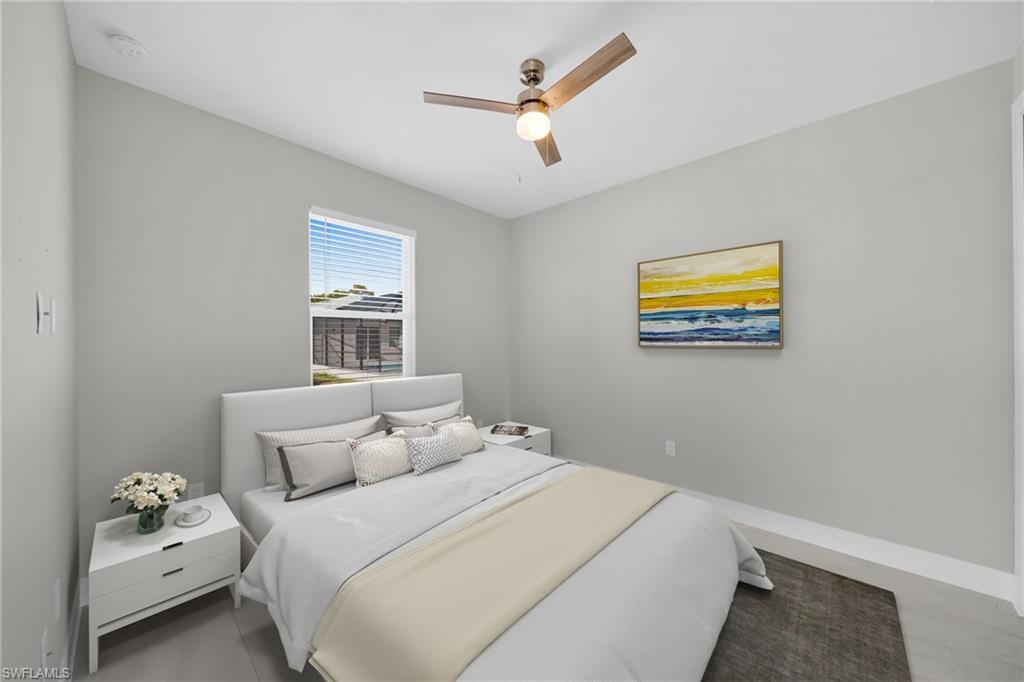 Bedroom with baseboards and ceiling fan