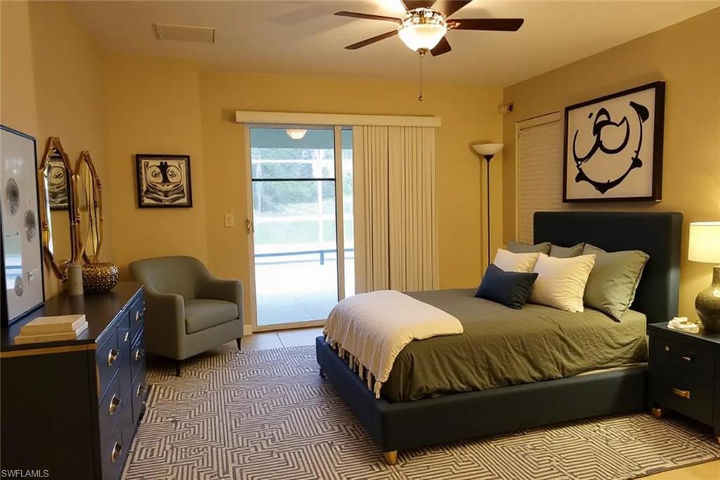 Bedroom with access to exterior and a ceiling fan