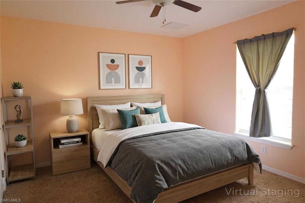 Bedroom with carpet flooring and ceiling fan